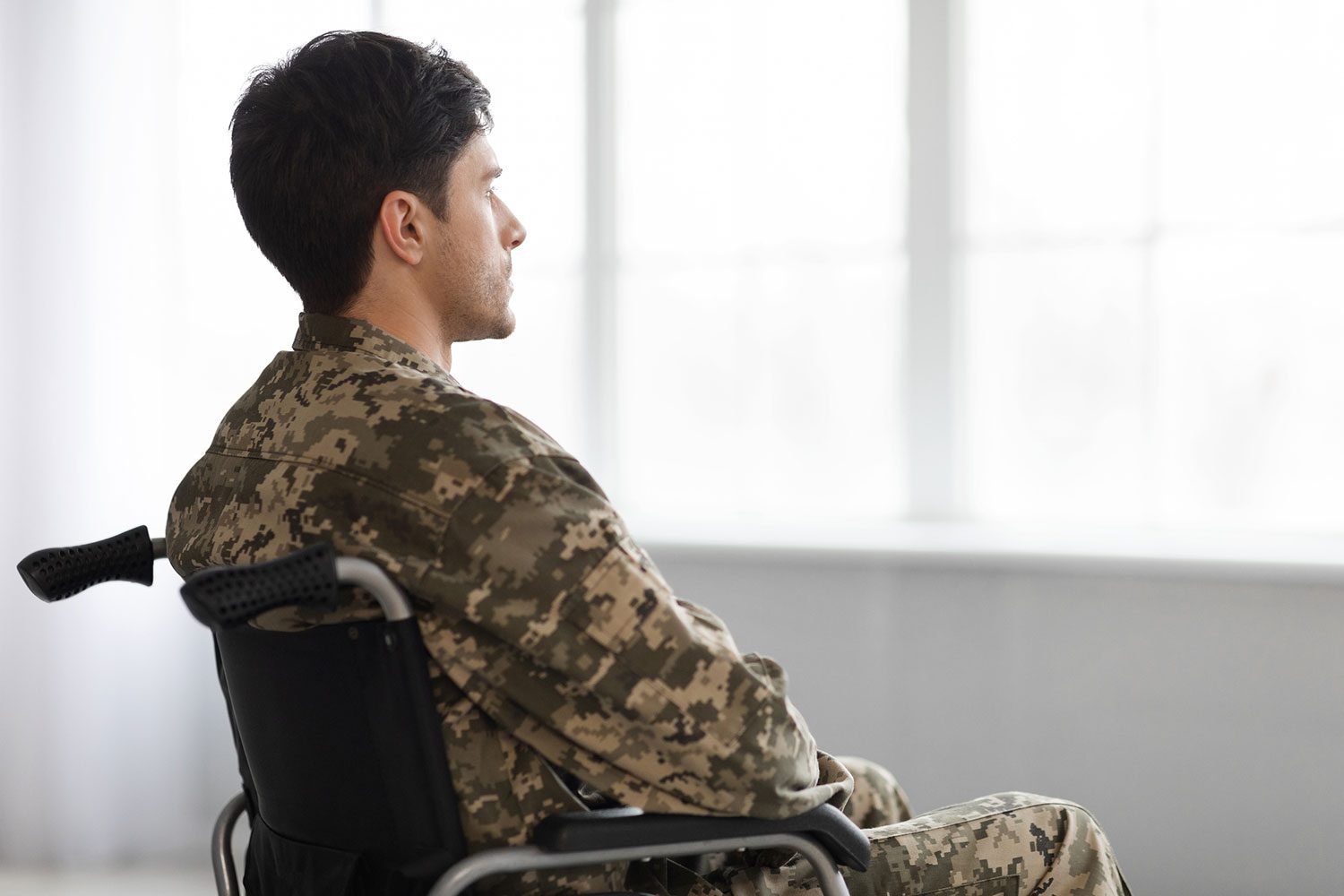 Featured image for free life insurance for 100% disabled Veterans showing a disabled Veteran sitting in a wheelchair